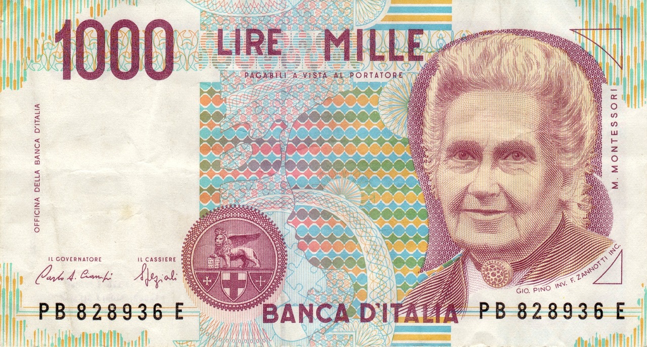 Moneta da 5 Lire con delfino, simbolo di valore collezionistico.